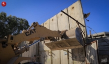 القسام تفكيك موقع الجدار